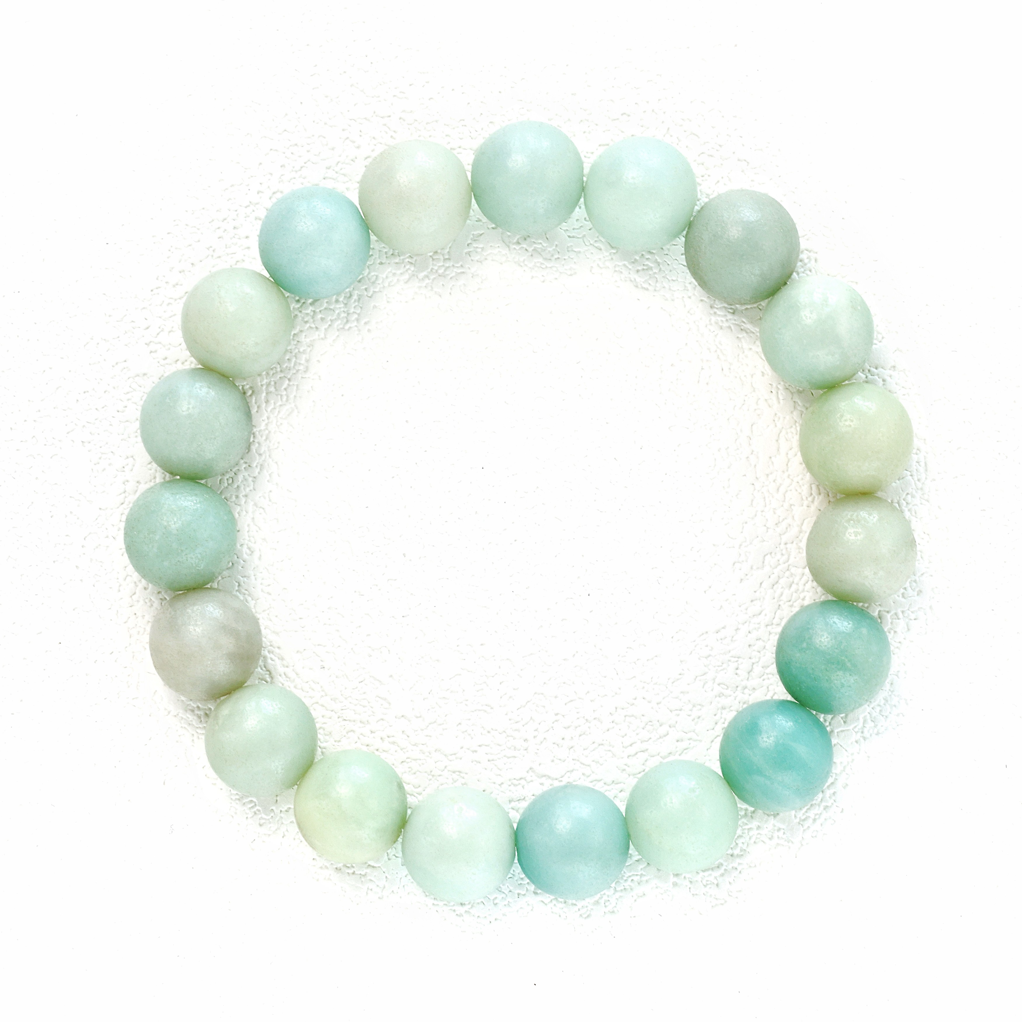 Liminéra Oasis Amazonite bracelet, characterized by its serene, pale muted green hues and smooth, earthy translucency.