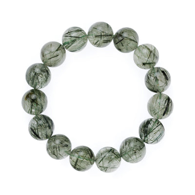 A premium Green Rutilated Quartz bracelet (Verdant) from the Liminéra Essential Collection, characterized by its dense needle-like inclusions and lush green hue.