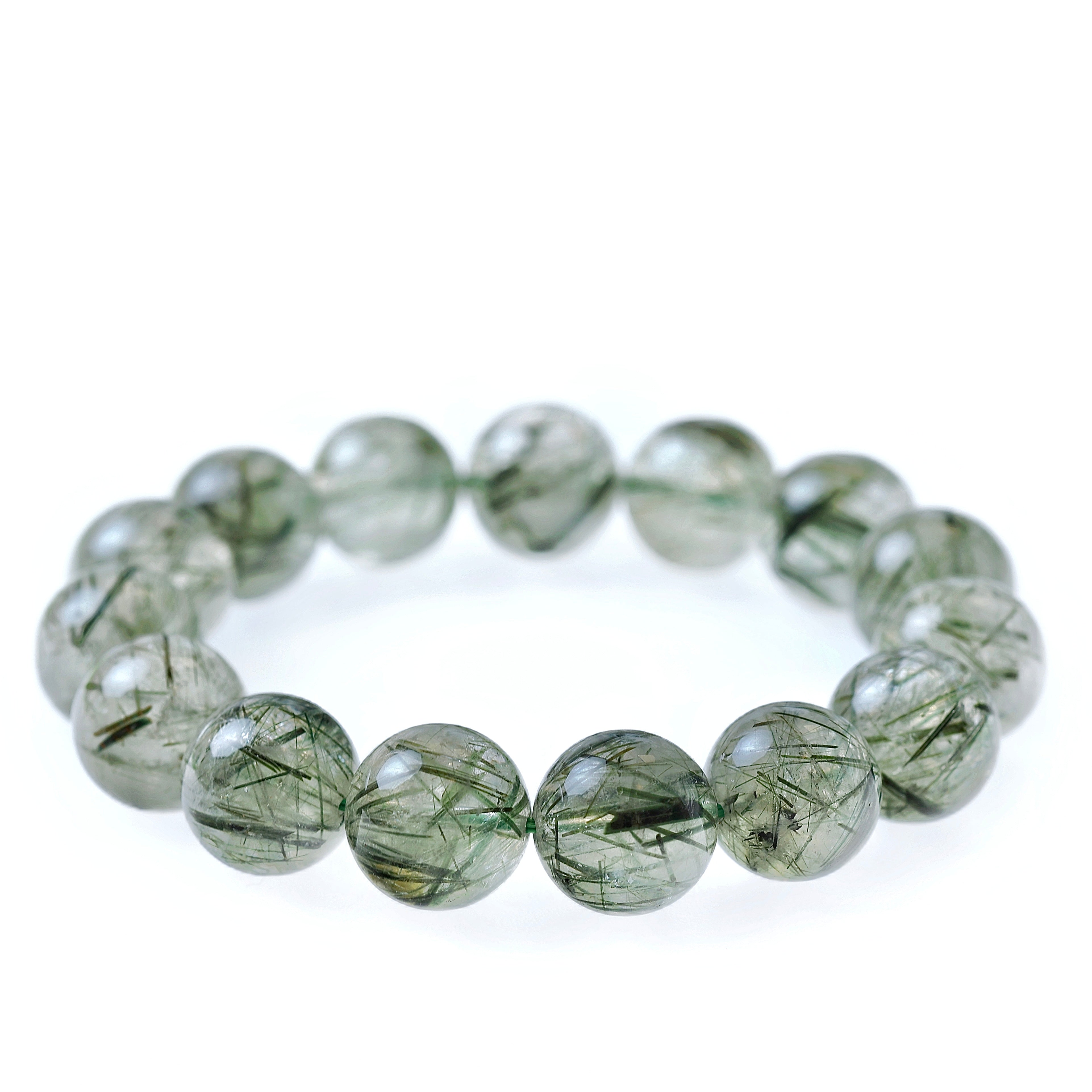 Detail view of the Liminéra Verdant bracelet, showcasing the natural textures of minimalist Green Rutilated Quartz for career focus and quiet luxury.