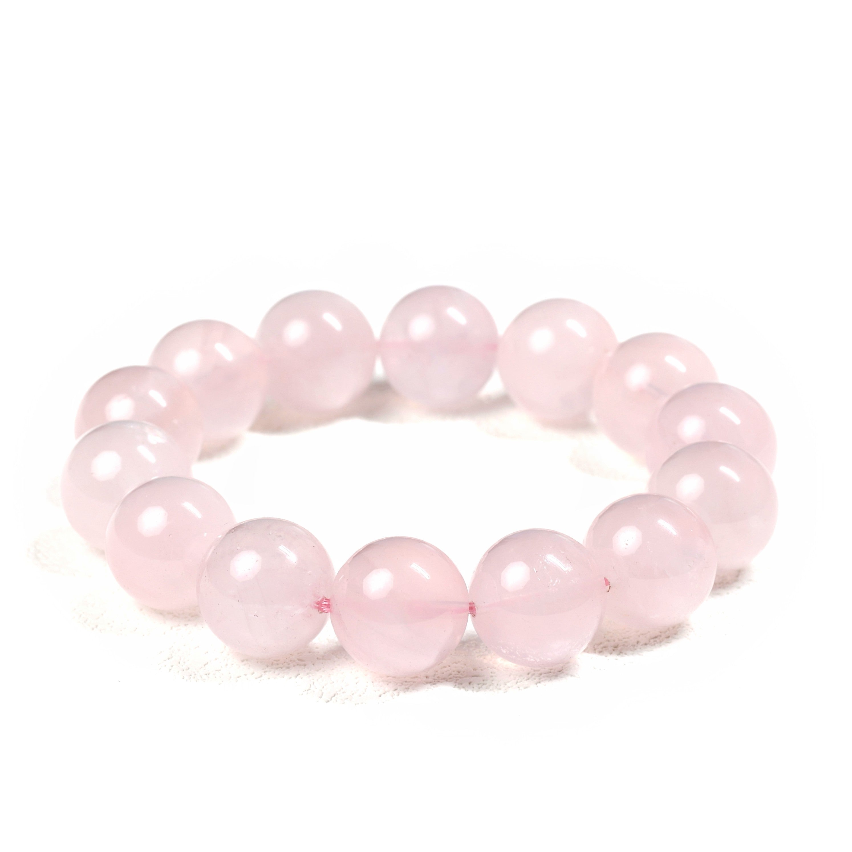 Side perspective of the Jelly pink crystal bracelet by Liminéra, showcasing the nurturing and warm energy of Madagascar Rose Quartz.